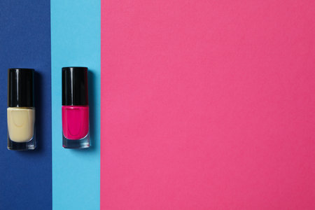 Multicolored nail polishes on a beautiful backgroundの写真素材