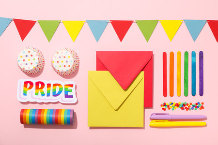 LGBT parade concept, holiday symbols on pink background.の写真素材