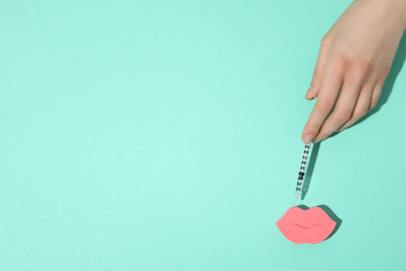 Injection of hyaluronic acid on a light background.