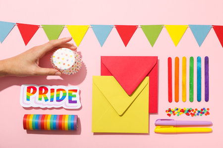 LGBT parade concept, holiday symbols on pink background.の写真素材