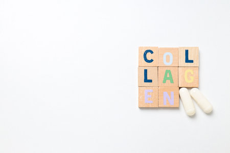 The description collagen on small wooden cubesの写真素材