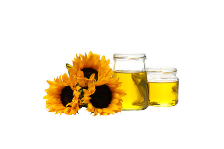 PNG, Sunflowers and oil in glass jars, isolated on white backgroundの写真素材