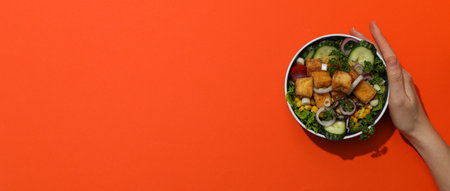 Fried tofu salad in a bowl, top viewの写真素材