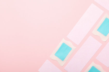 Strips for depilation on a pink backgroundの写真素材