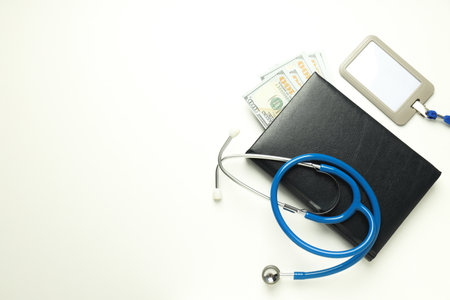 Money with medical equipment, concept of corruption in medicine.の写真素材