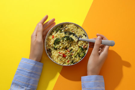 A tart with pilaf, on a yellow background.の写真素材