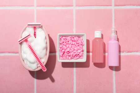 Accessories for depilation on a pink backgroundの写真素材