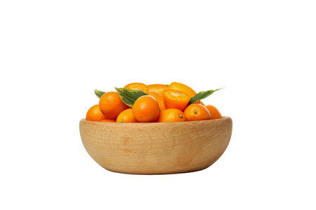 PNG, Fresh kumquat fruits with leaves in wooden bowl, isolated on white backgroundの写真素材