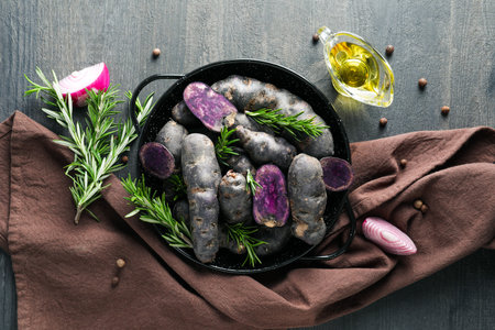 Concept of unusual vegetable - purple potato vegetableの写真素材