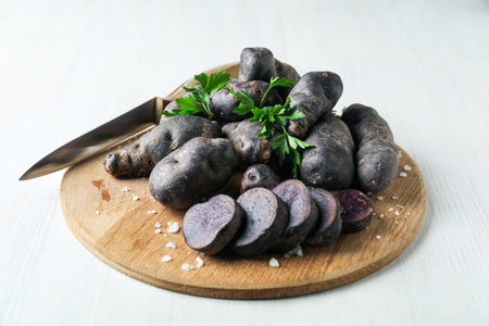 Concept of unusual vegetable - purple potato vegetableの写真素材