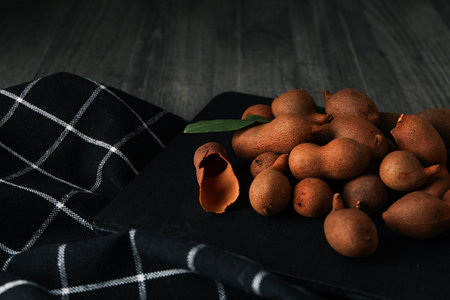 Tamarind fruit, concept of delicious food, fresh tamarindの写真素材