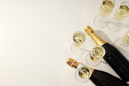A bottle of champagne with glasses on a light backgroundの写真素材
