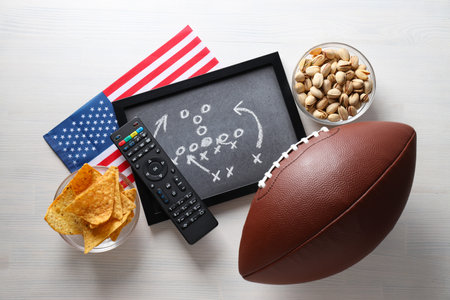 Blackboard with game strategy and rugby ballの写真素材