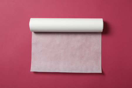 White baking paper on a pink background