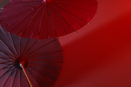 Beautiful Japanese umbrellas on a red background