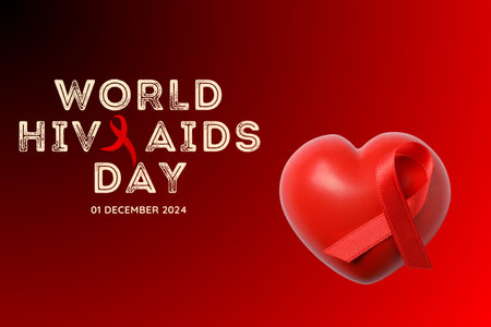 AIDS day, red ribbon and heart on a red background with textの写真素材