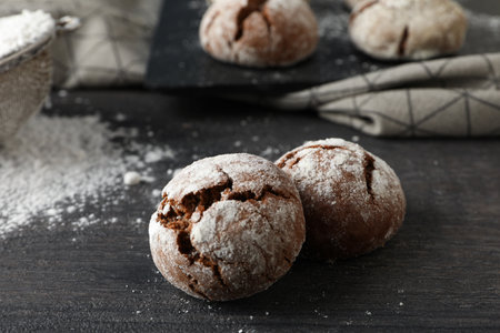 Delicious Grinkle cookies in a glass jar, on a light background.