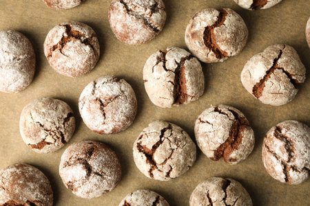 Appetizing crinkle cookies, on parchment, on a dark background.の写真素材