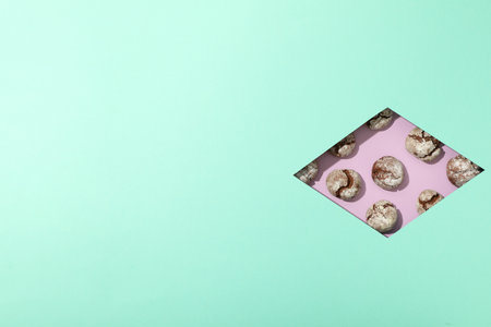 Crinkle cookies on blue background, space for textの写真素材