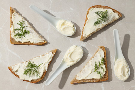 Sandwiches with Philadelphia cheese on a light background.