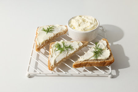 Sandwiches with Philadelphia cheese on a light background.