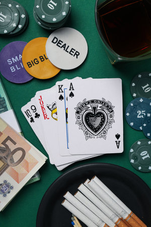 The concept of playing poker, playing cards with chips on the table