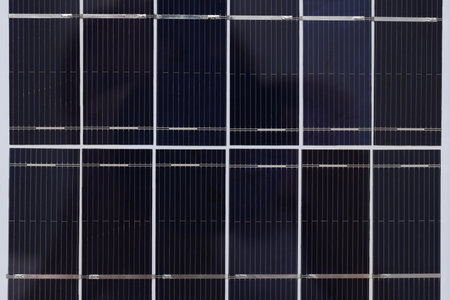 A close-up view of a portable black solar panel
