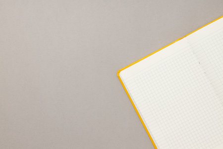 An open notebook lies on a light backgroundの写真素材