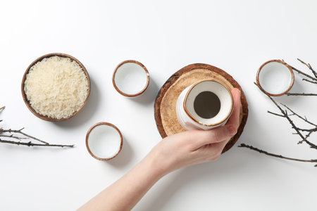 Japanese rice tincture, an alcoholic drink, on a light background.の写真素材