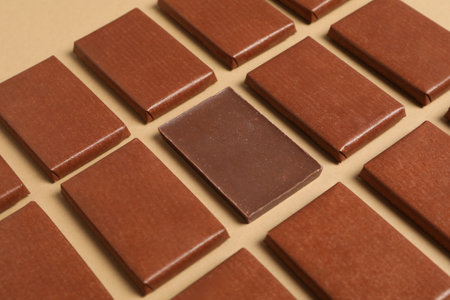 Brown chocolate bars on a light background