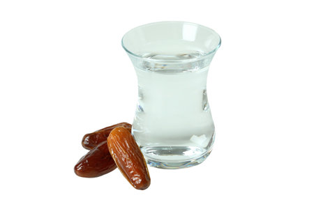 PNG, Ramadan. Glass of water with dates, isolated on white background.の写真素材