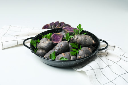 Concept of unusual vegetable - purple potato vegetableの写真素材
