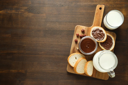 Morning food concept - tasty bread with chocolate spreadの写真素材