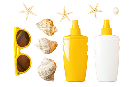 Sunglasses and sunscreen ready for a sunny beach day, isolated on whiteの写真素材
