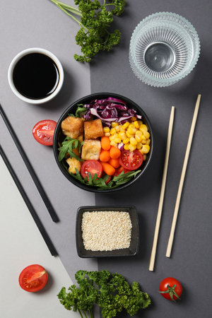 Fried tofu salad with sticks and soy sauceの写真素材