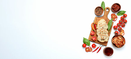 The concept of Italian cuisine, sun-dried tomatoes on a light background.