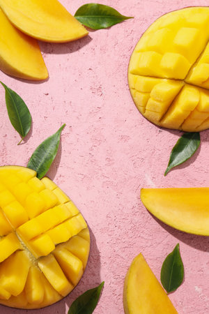 Fresh cut mango on a pink backgroundの写真素材