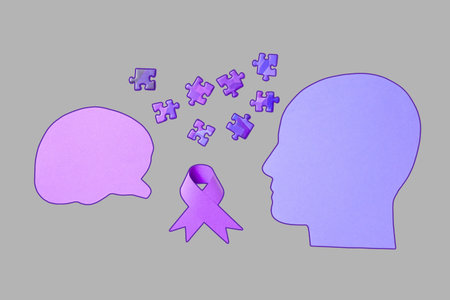 Purple ribbon and puzzles symbolize mental health awarenessの写真素材