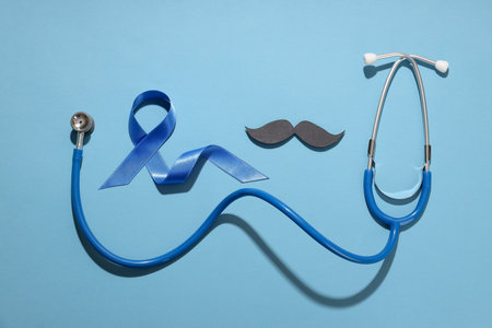 Stethoscope, blue ribbon, and mustache for awareness.の写真素材