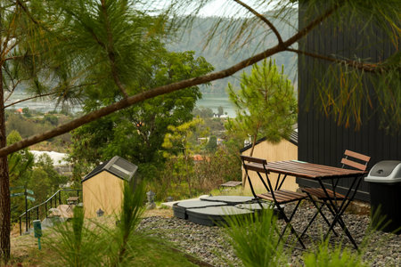 Cozy seating offers views of mountains and river