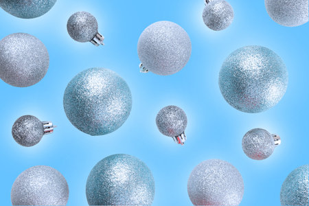 Blue and silver glitter ornaments add festive charm