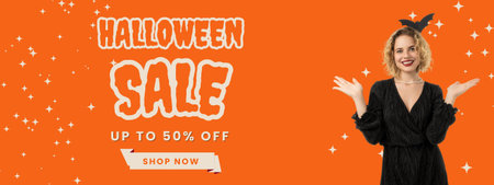 Smiling woman celebrates Halloweenの写真素材