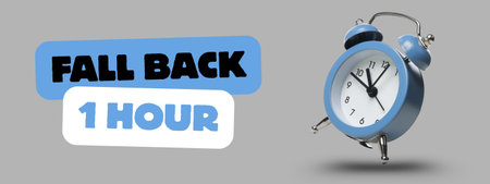 Clock positioned to show the fall back time changeの写真素材