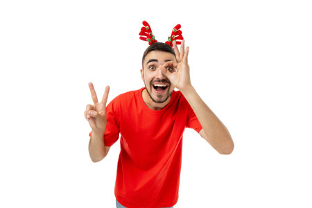 Young man in red shirt and antlers celebrate, isolated, PNGの写真素材