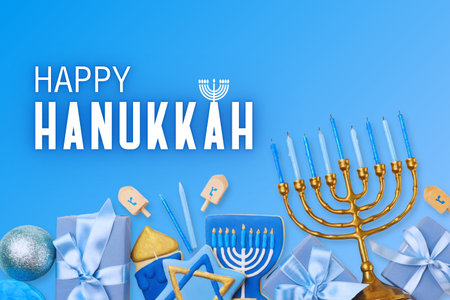 Festive Hanukkah items including menorah, dreidels, and giftsの写真素材
