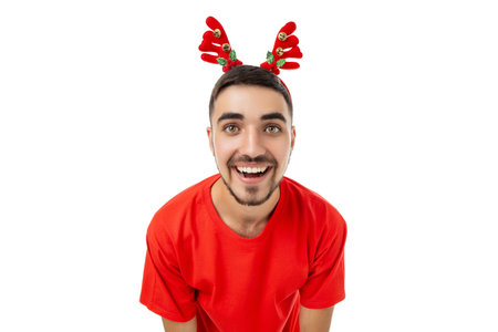 Smiling person in red with reindeer antlers, isolated, PNGの写真素材