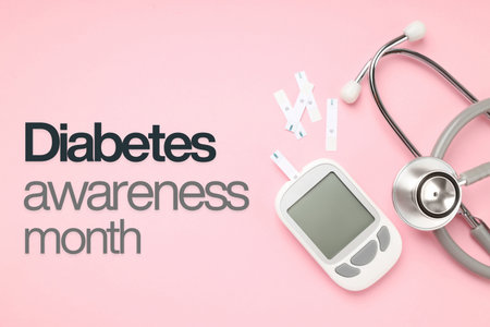Diabetes awareness materials and tools on a pink backdropの写真素材