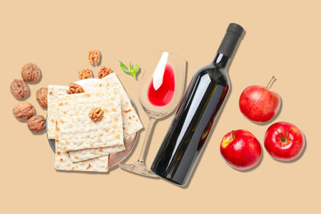 Table set with matzah, wine, walnuts, and apples for Passover
