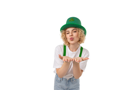 Woman in a green hat blowing kisses, isolated, PNG
