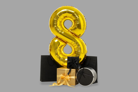 Gold number 8 balloon with gifts for a special event